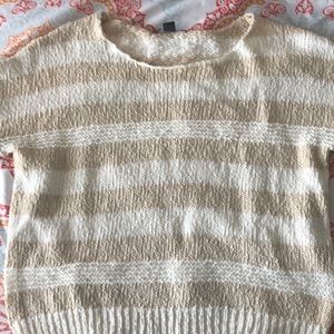a cream sweater